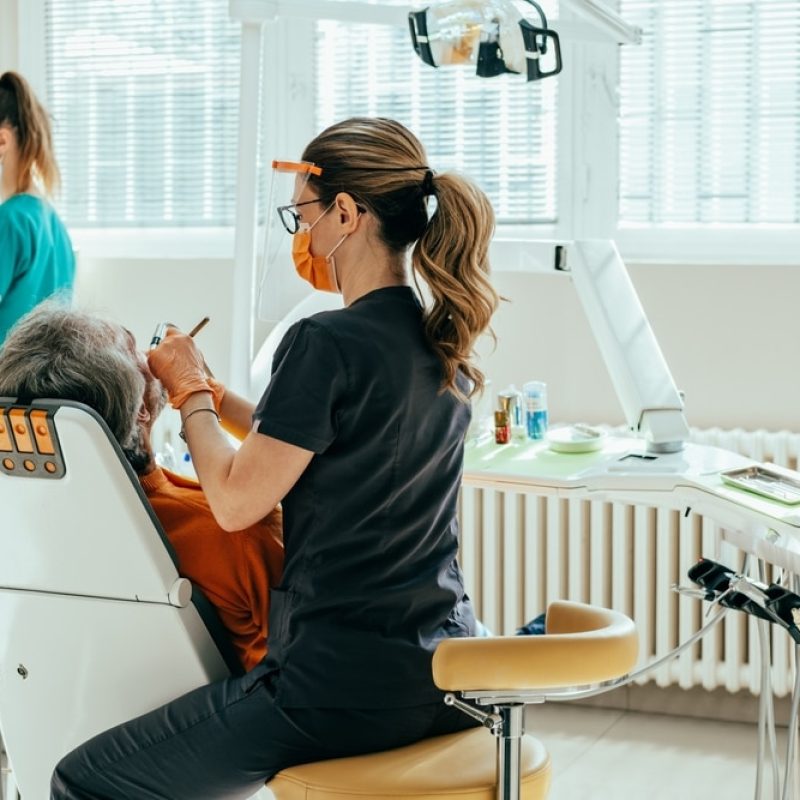 Woman,Dentist,In,Protective,Workwear,Using,Dental,Drill,For,Treating Woman,Dentist,In,Protective,Workwear,Using,Dental,Drill,For,Treating